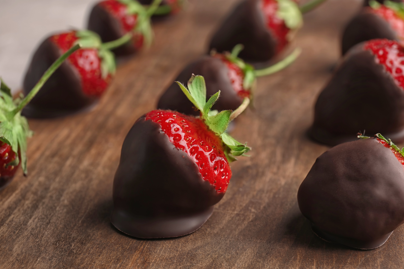 Chocolate Covered Strawberries on Wooden Board, Closeup